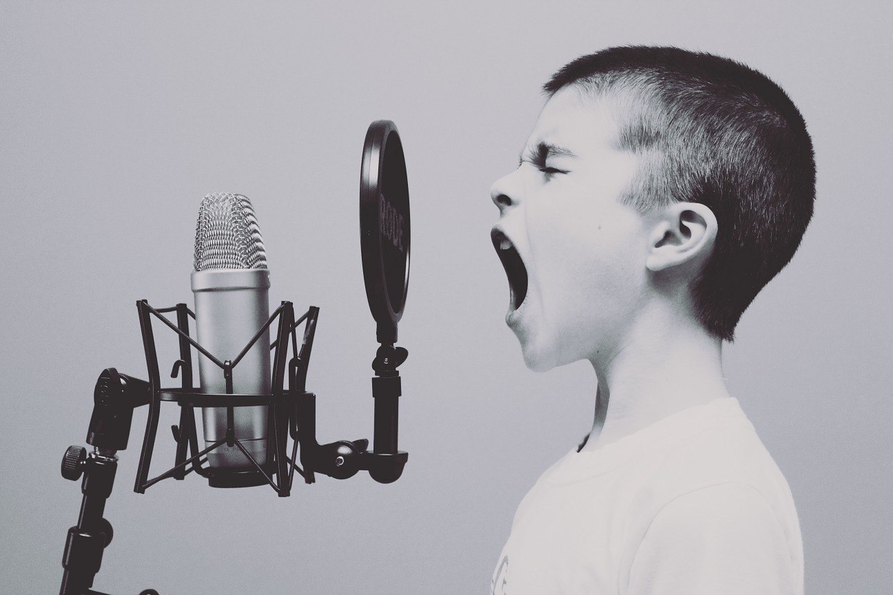 microphone podcasting podcast speaking how to start a corporate podcast