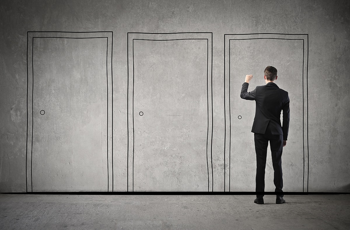 Man Knocking on One of Three Chalk Doors